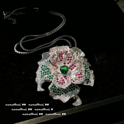 3405K Camellia Brooch, Peacock Green Zircon Core