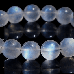 5A Cream-Body Blue Flash Moonstone · 7–7.5 mm · single wrap (~25 beads)